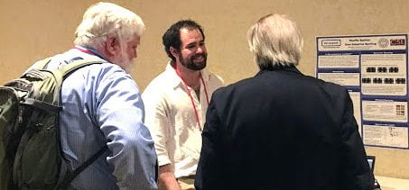 Matt Higger discusses Shuffle Speller with Gregg Vanderheiden and Denis Anson at the RESNA 2017 Conference.