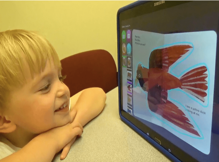 child looking at screen